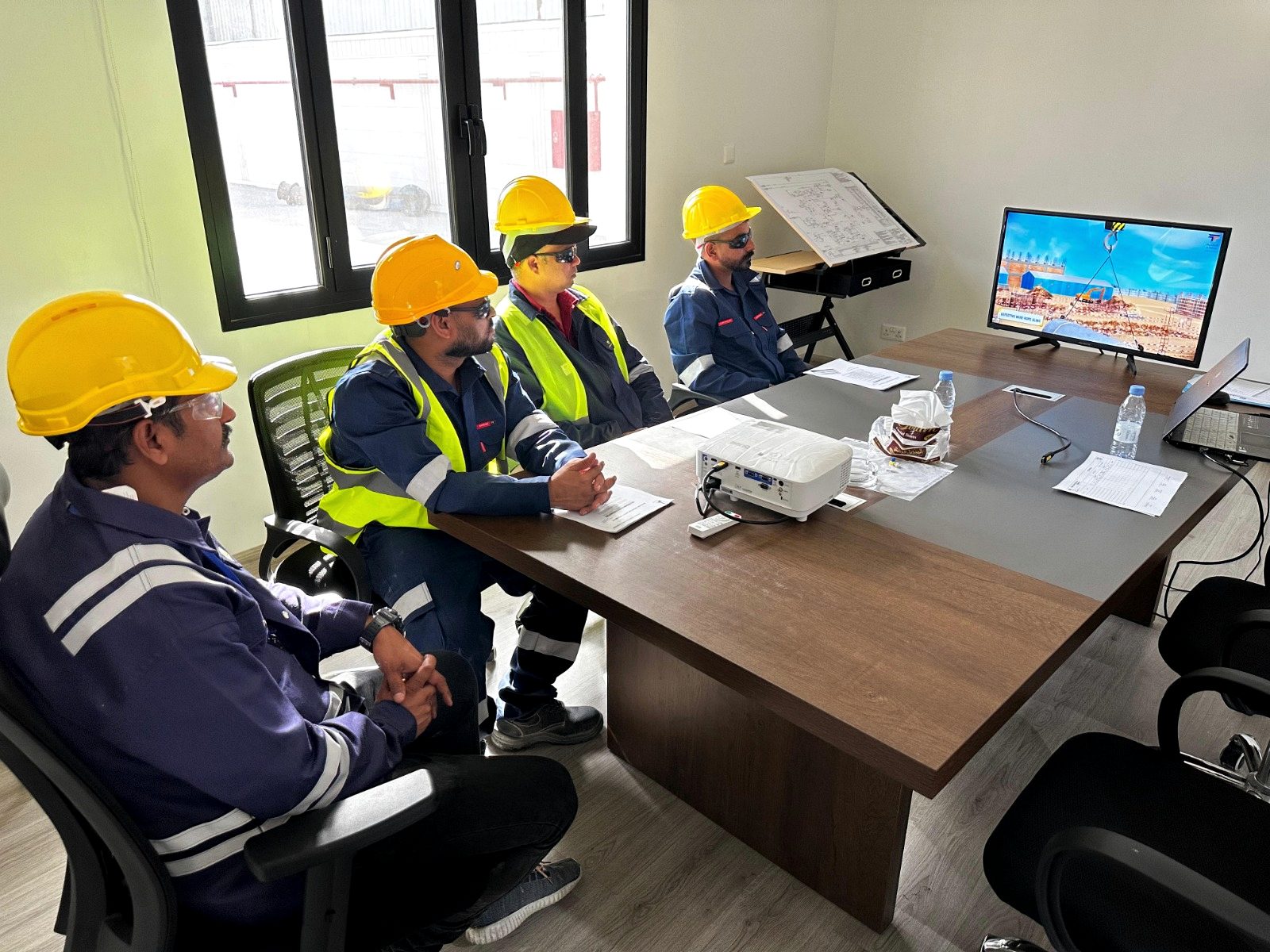 RANCO crew in PPE at a toolbox safety talk